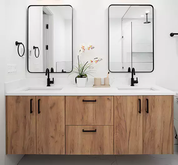 Why Choose Raymark Bathroom Remodeling for Quality Bathroom Cabinet Remodel Services in Clare, MI?